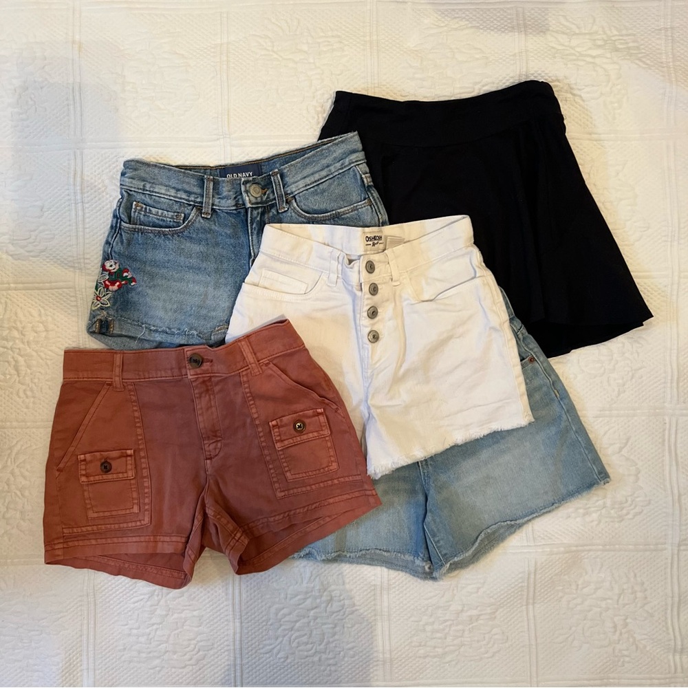 Girls size 8 bottoms. Four pairs of shorts and one skirt